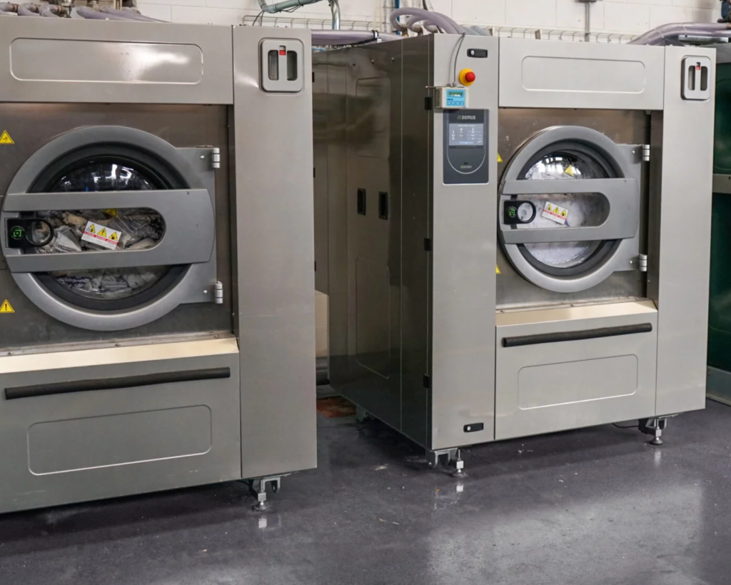 Heavy-duty washers in a correctional facility supported by SELaundry’s service team.