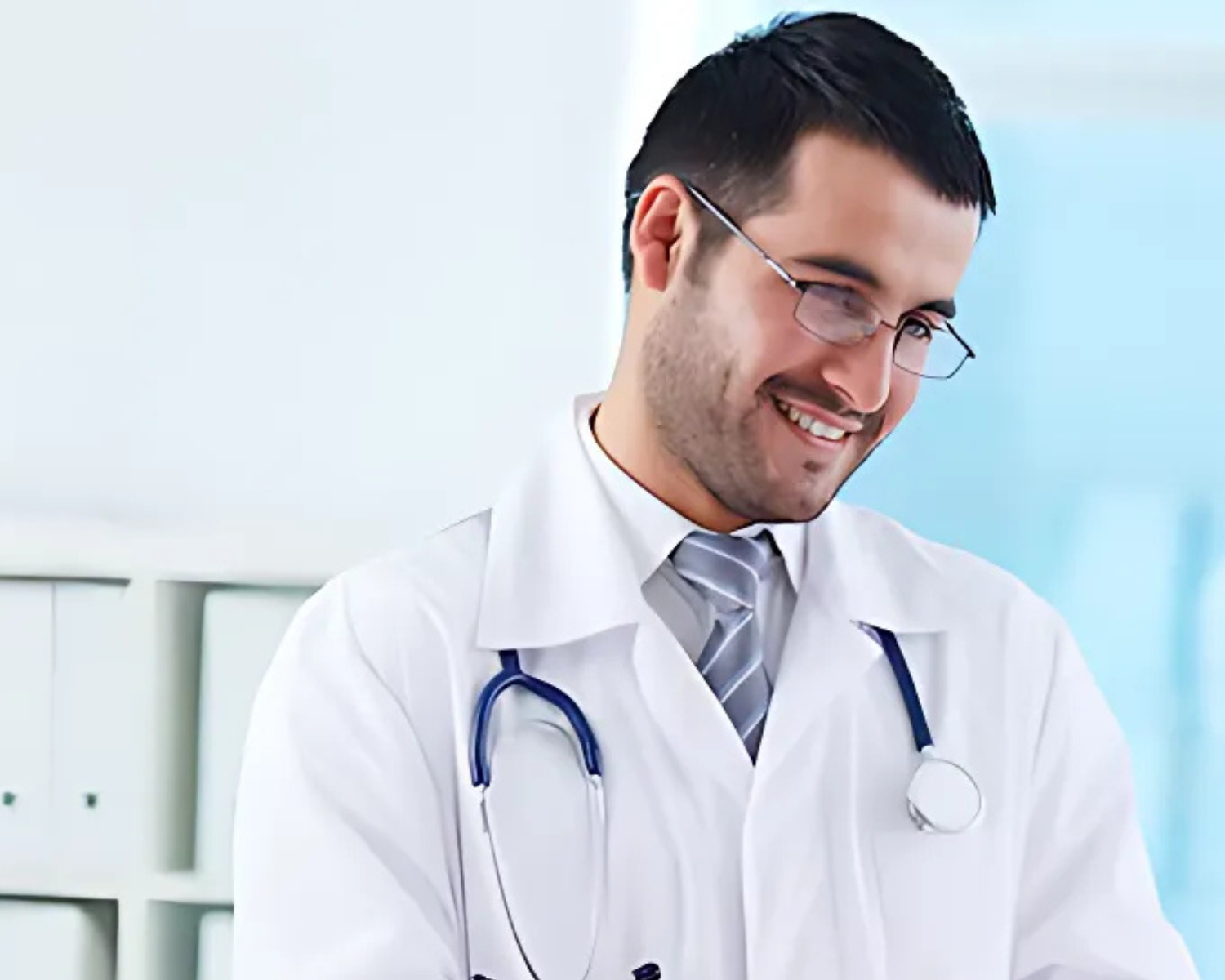 Healthcare provider working in a clean clinical environment that depends on consistent laundry performance