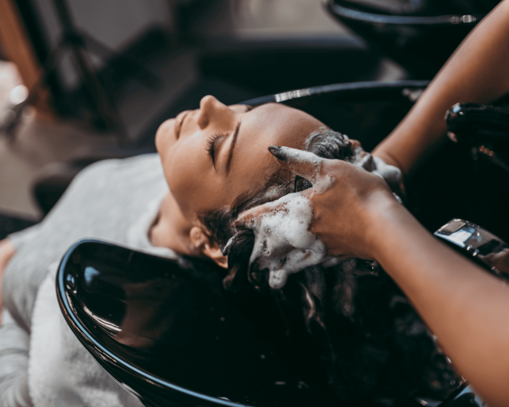 Clean salon towels and linens used during hair washing services in North Augusta