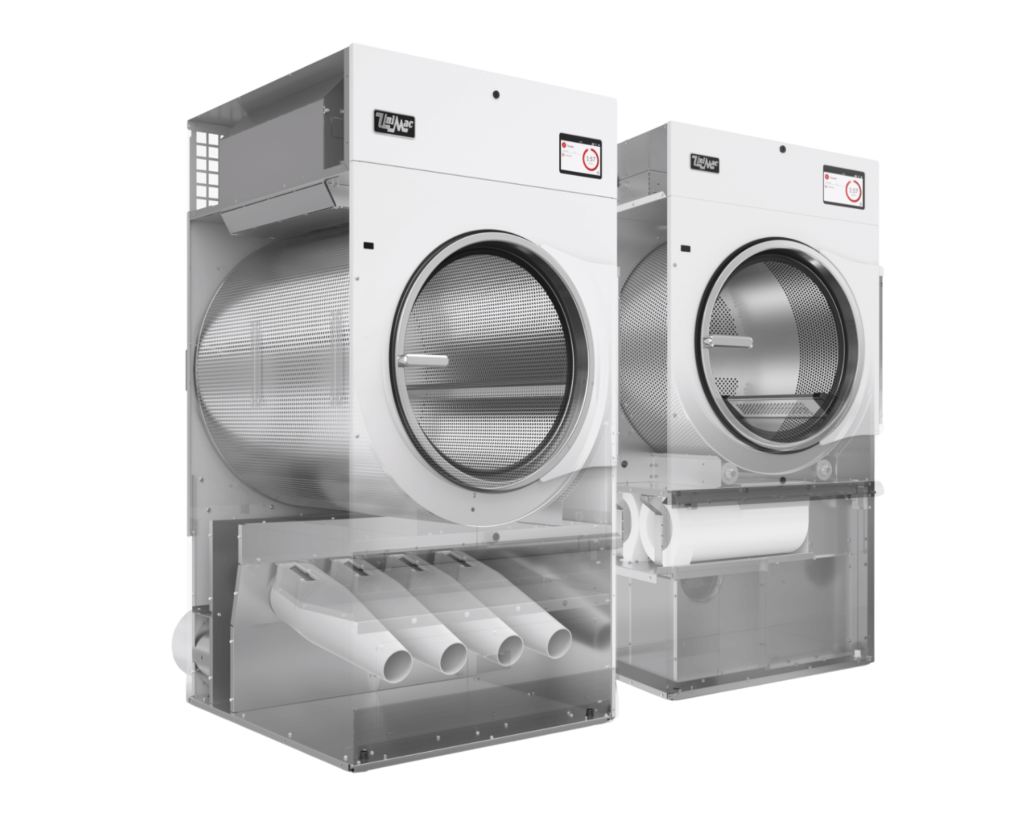 Cutaway view of professional laundry dryers displaying internal drum structure and airflow pathways.