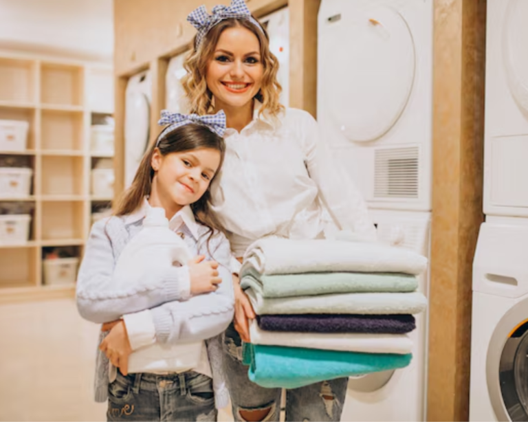 Mother and daughter doing laundry together in a bright Millbrook laundry room with modern machines.