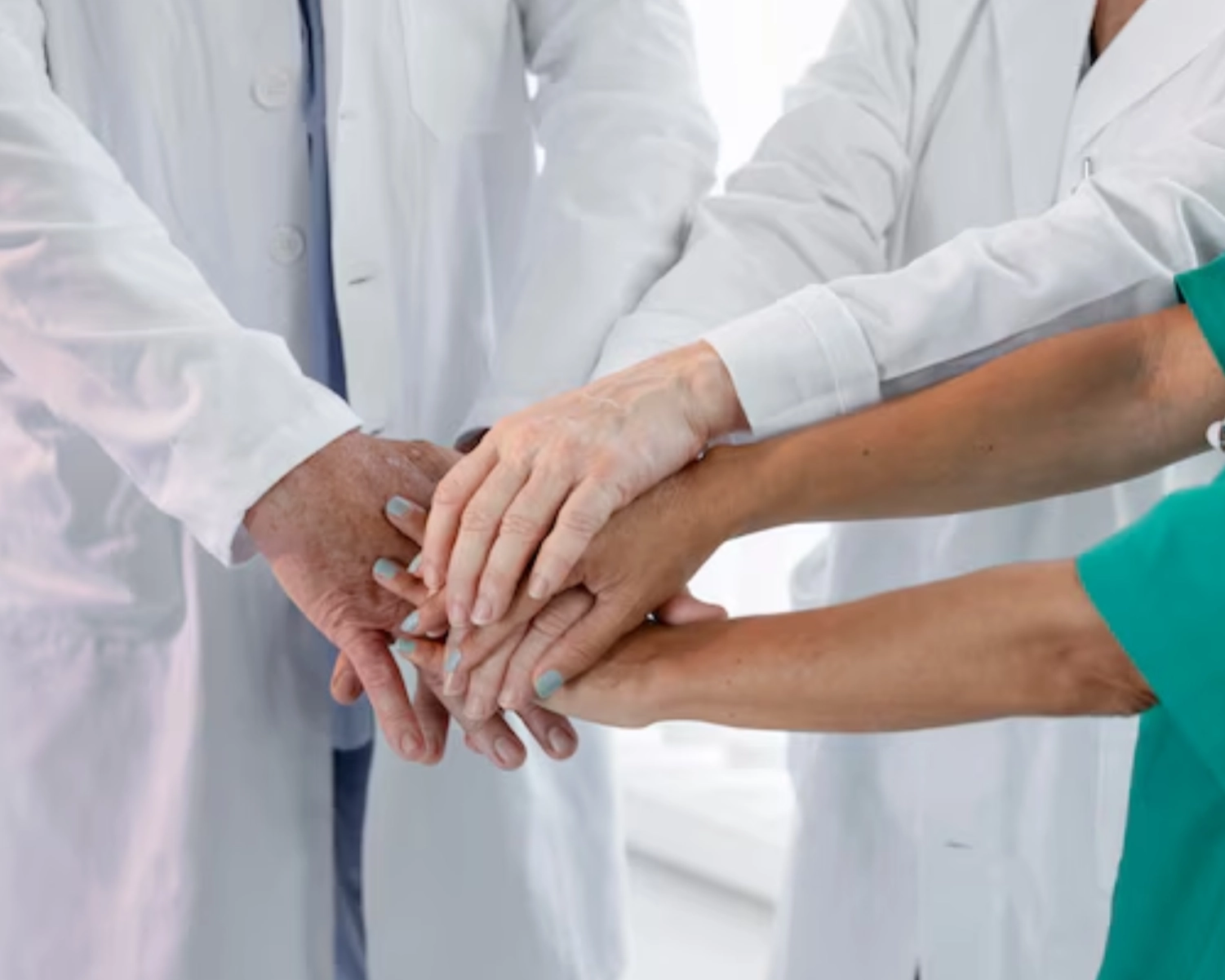 Healthcare professionals collaborating at a Richmond Hill medical facility using commercial laundry equipment from Southeastern Laundry.