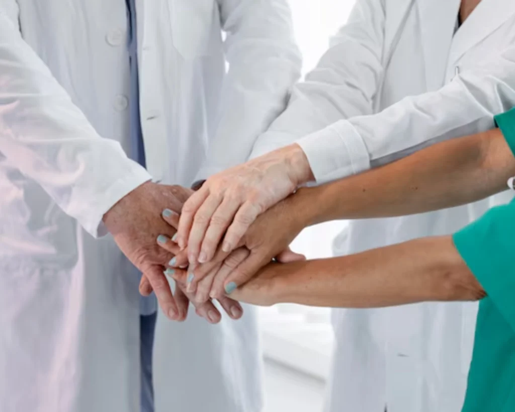 Healthcare staff supporting daily operations that rely on reliable on-premise laundry equipment for linens and uniforms.