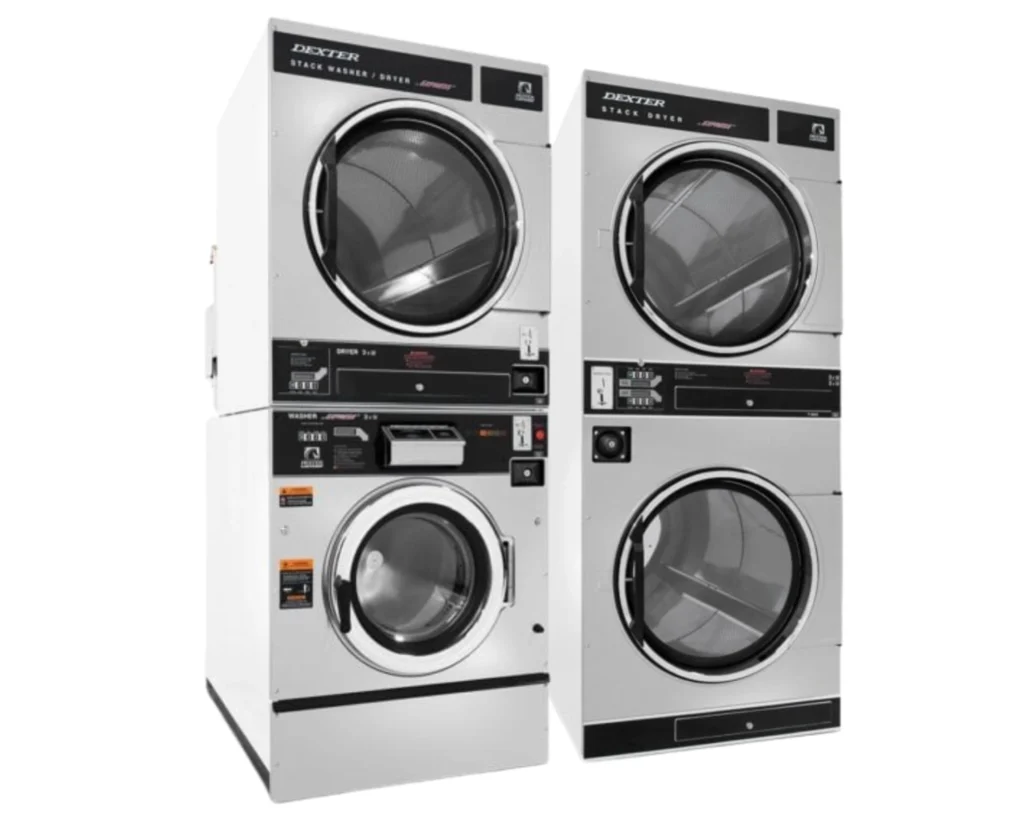 Dexter stacked washer and dryer units displayed as commercial laundry equipment during an industry expo.
