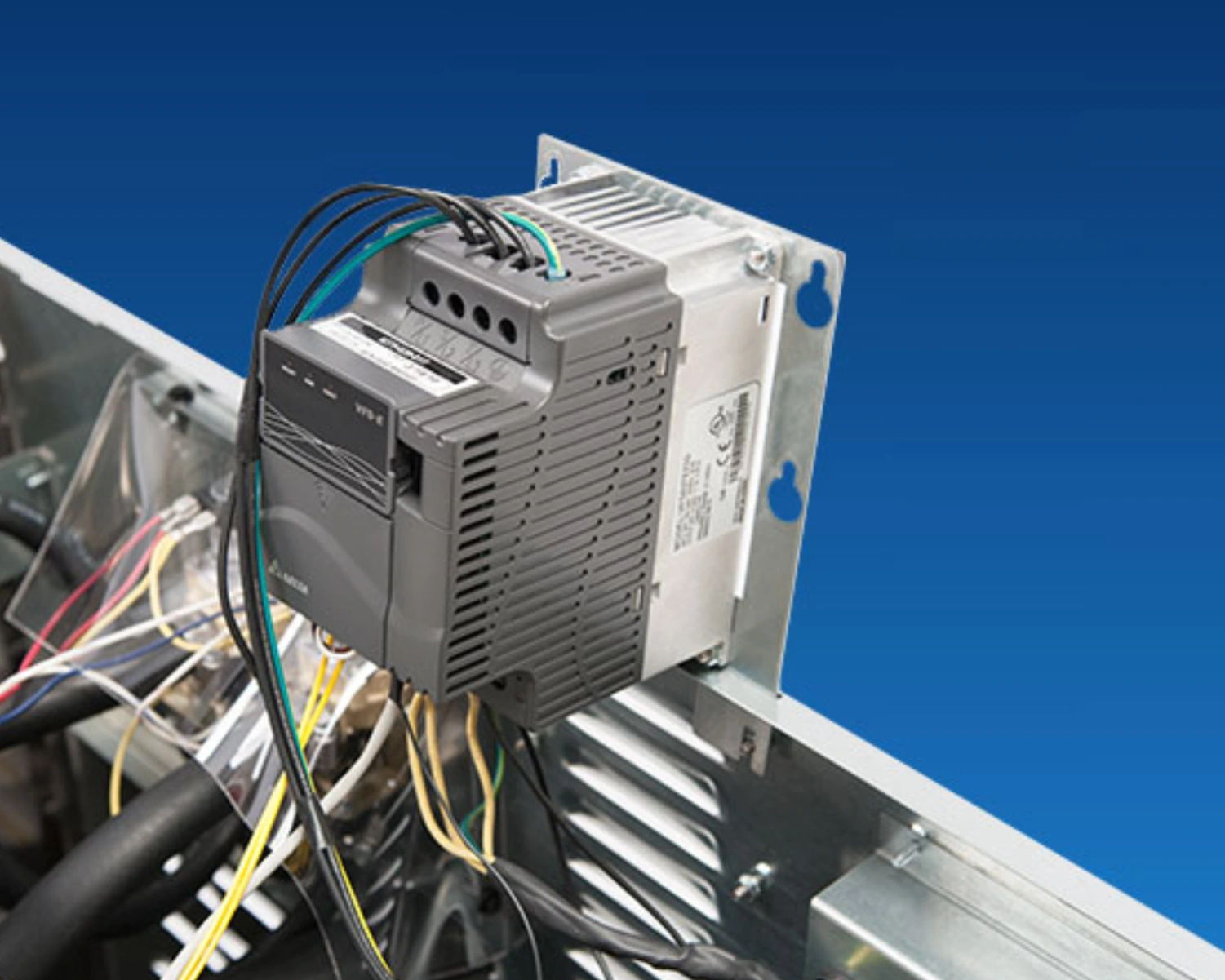 Close-up view of a commercial washer’s control module and wiring during equipment maintenance in Orlando.