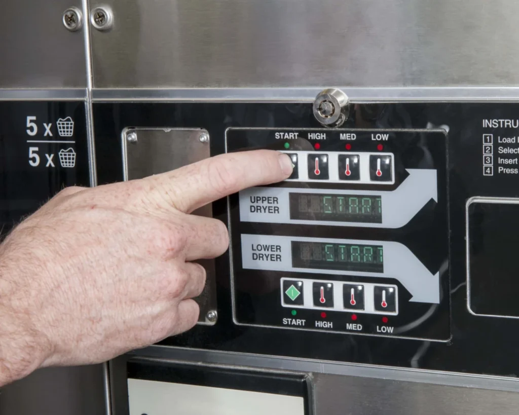 Commercial laundry maintenance plans include checking dryer controls and performance during routine service visits.