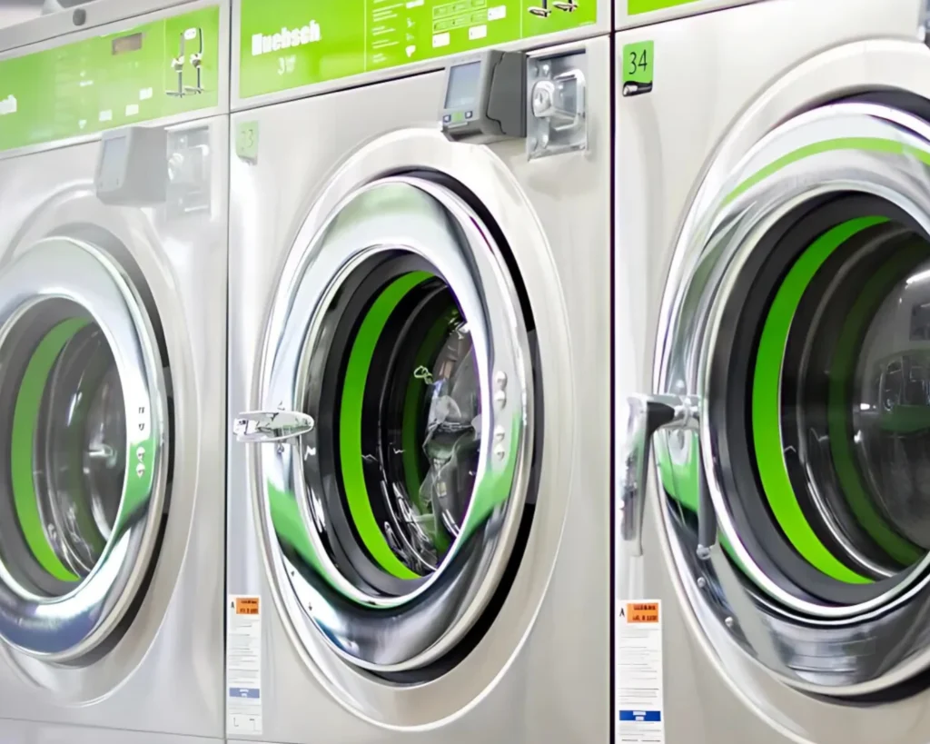 Modern washer row that can help improve your laundromat layout with cleaner traffic flow and better machine access