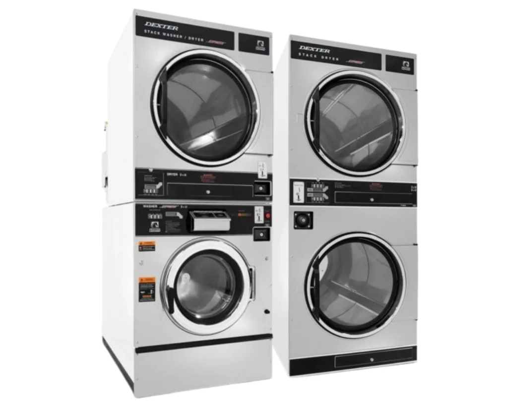 Commercial stacked washers and dryers equipped for a laundry payment system in a multi-family property.